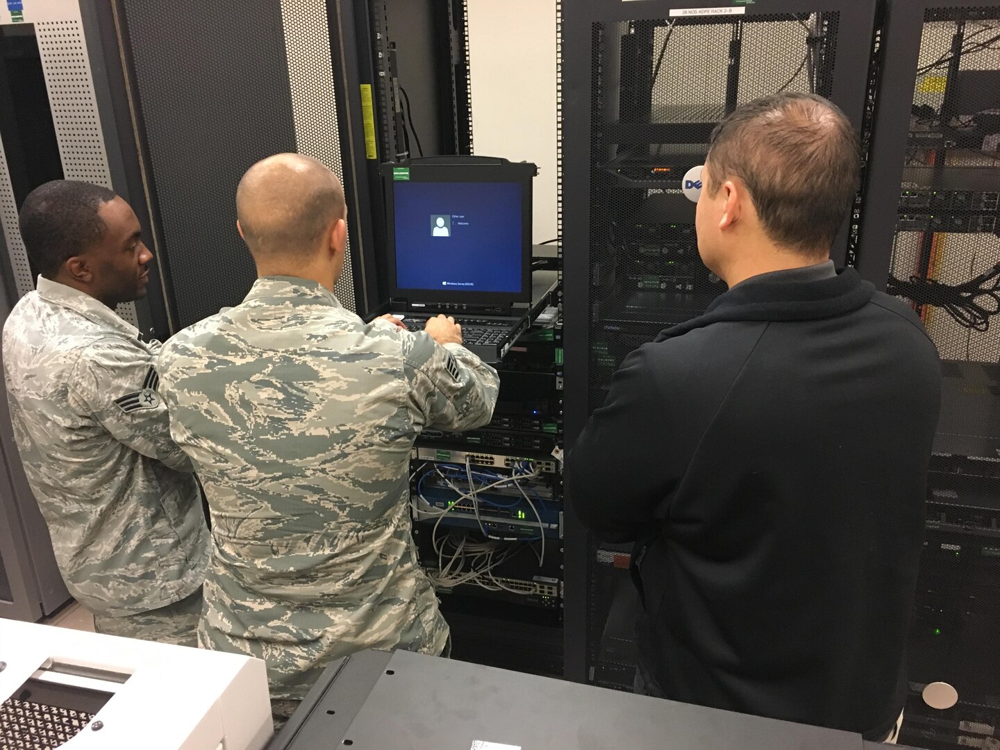 Members of the 26th Network Operations Squadron perform maintenance on an Air Force gateway server Nov. 2, 2017, at Maxwell Air Force Base-Gunter Annex, Alabama. While the migration to the Joint Regional Security Stacks will transition ownership of security architecture from the Air Force to Defense Information Systems Agency, the 26th NOS will retain operational control of traffic flow for Air Force networks. (U.S. Courtesy photo)