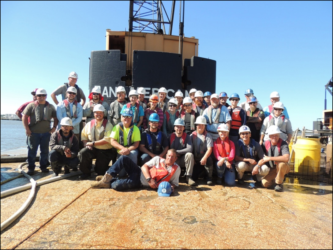 Corps’ Technical Project Manager and Lead Archaeologist responsible for organizing, coordinating and managing the CSS Georgia recovery efforts, Julie Morgan (third from right), shown with CSS Georgia Recovery Team in 2015.