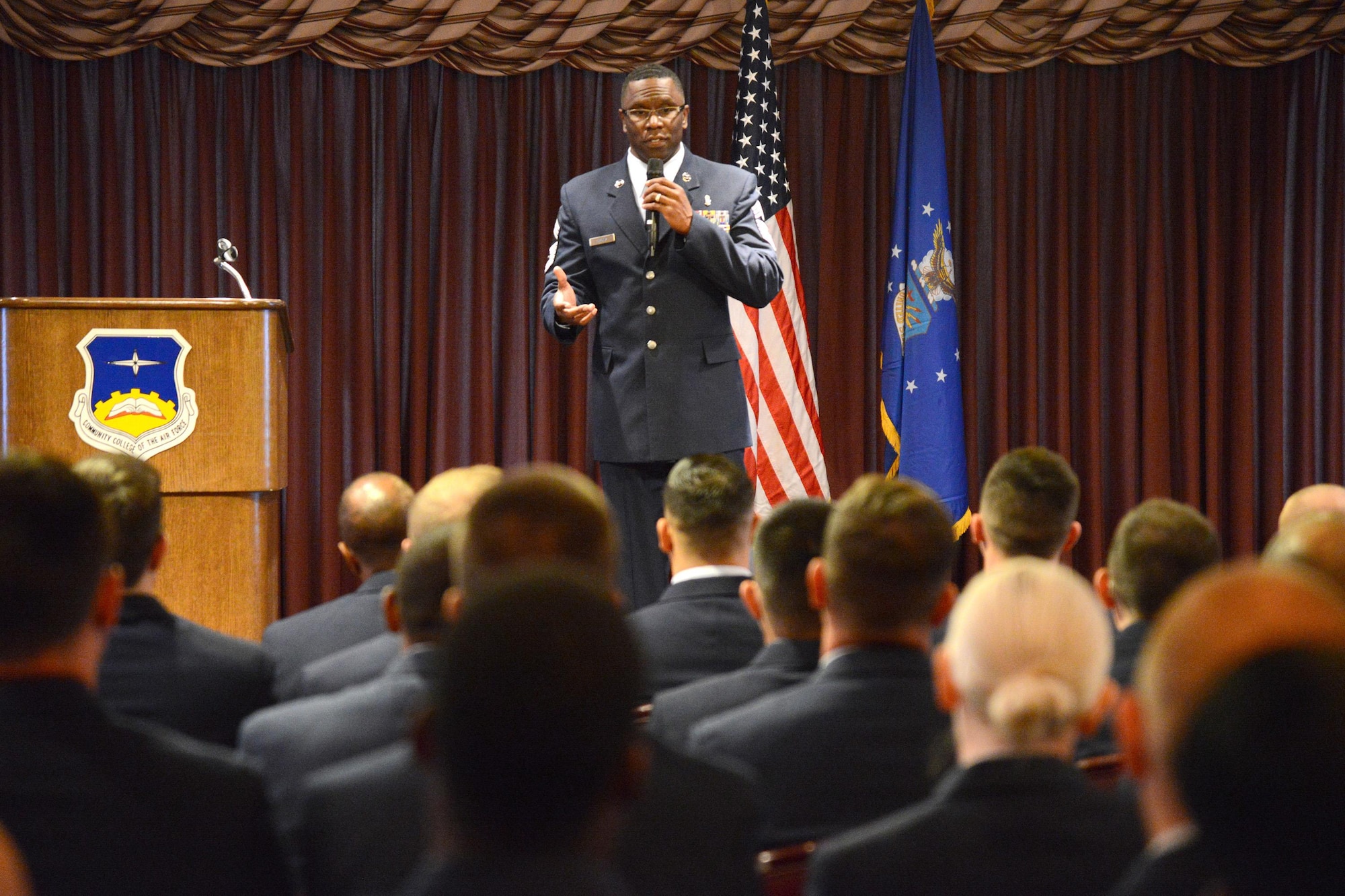 Chief Master Sgt. Paul Thomas, superintendent of the 72nd Medical Group, was the guest speaker at the Community College of the Air Force Graduation held in the Tinker Club Oct. 27.