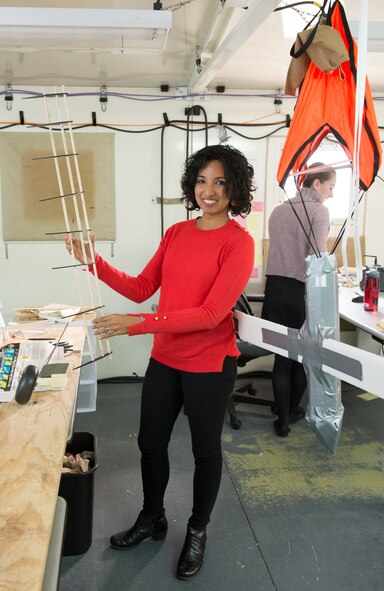 Veena Meer, a program manager for IT security systems in the Command, Control, Communications, Intelligence and Networks Directorate at Hanscom Air Force Base, Mass., holds 3D printed airfoils, which will help fabricate an aircraft for the Air Force Research Lab’s 2018 Commander’s Challenge.