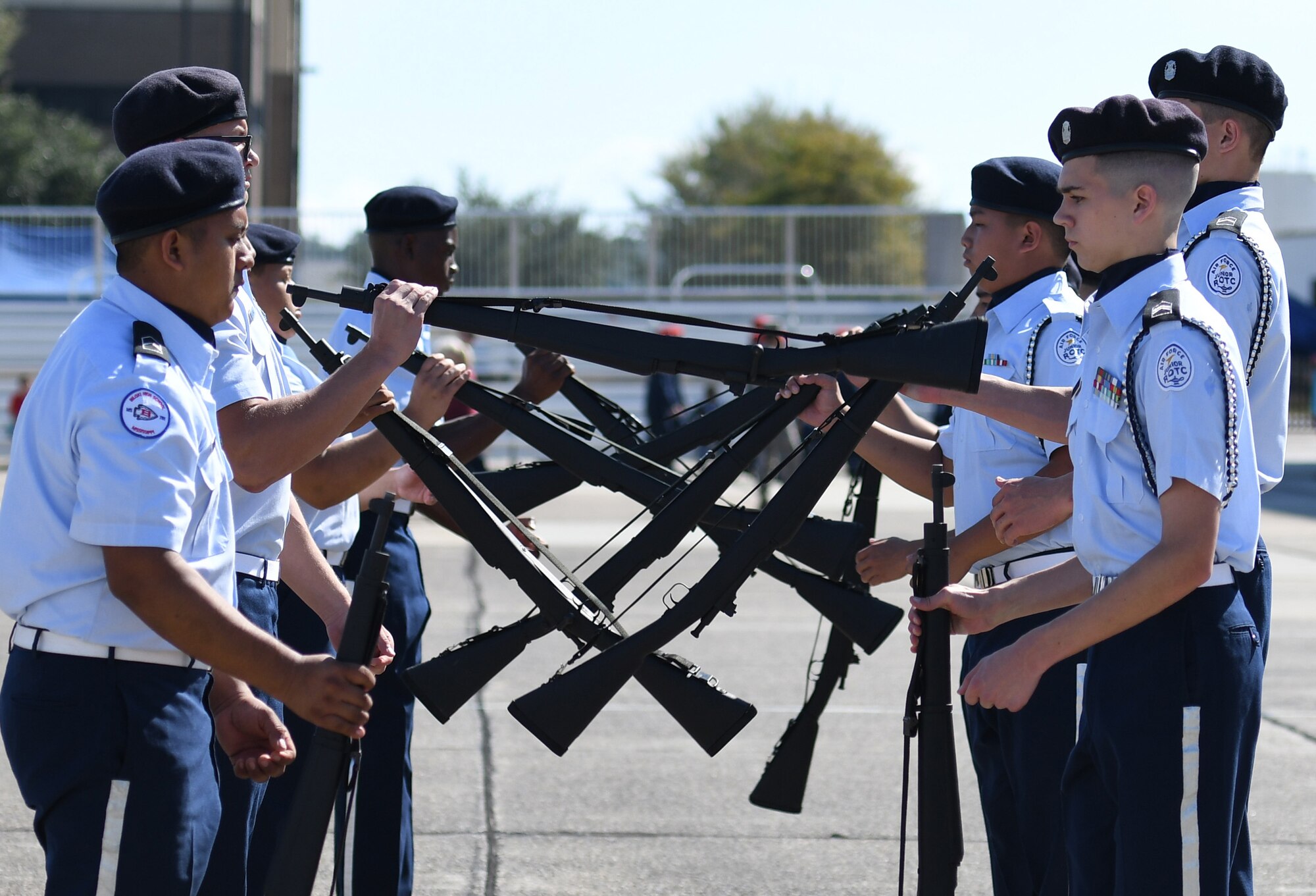 Biloxi High School Air Force Junior ROTC  compete in the armed exhibition drill during the Fourth Annual Mississippi All-Services Junior ROTC Drill Competition Nov. 4, 2017, on Keesler Air Force Base, Mississippi. More than 400 Junior ROTC cadets, spectators and volunteers were in attendance where cadets battled for the best all-services Junior ROTC team in Mississippi. Thirteen Junior ROTC teams from all military branches were represented at the event with the Pearl High School Navy Junior ROTC earning the top honors. (U.S. Air Force photo by Kemberly Groue)