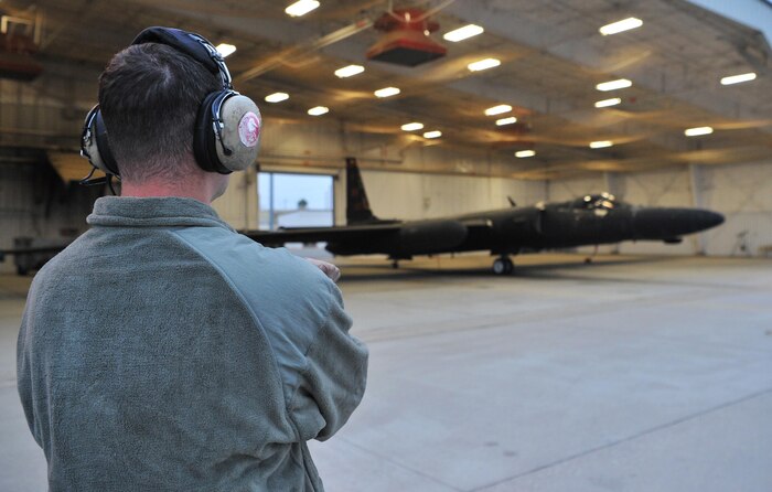 A 9th Aircraft Maintenance Squadron Airman prepares a U-2 Dragon Lady for takeoff in a hangar during Global Thunder 18,