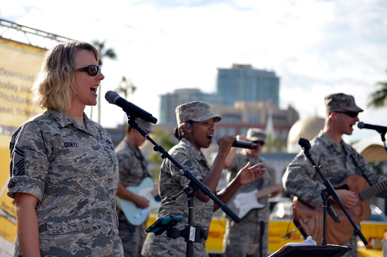 The United States Air Force Band of the West performs at Arizona State University’s annual Salute to Service tailgate event in Tempe, Ariz., Nov. 4, 2017. The Salute to Service initiative honors military members past and present for their sacrifices to our country by hosting service themed events. (U.S. Air Force photo/Senior Airman Devante Williams)