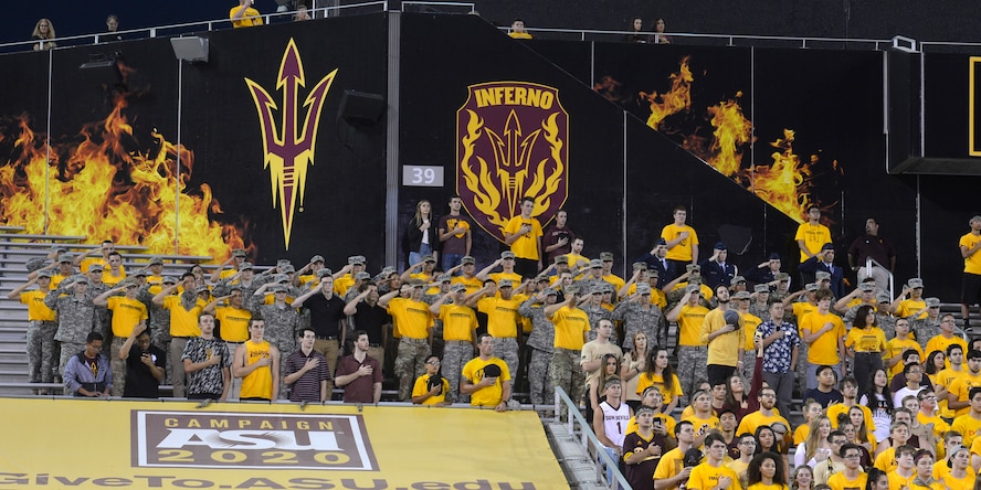 Members of the U.S. Army salute during the National Anthem at the Arizona State University’s annual Salute to Service football game in Tempe, Ariz., Nov. 4, 2017. The Salute to Service initiative honors military members past and present for their sacrifices to our country by hosting service themed events. (U.S. Air Force photo/Senior Airman Devante Williams)