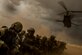 U.S. Air Force and coalition forces cover themselves as a CH-47 Chinook helicopter takes off at Florence, Ariz., during Angel Thunder 17, May 9, 2017. Angel Thunder is a two-week, Air Combat Command-sponsored, joint certified and accredited personnel recovery exercise focused on search and rescue. The exercise is designed to provide training for personnel recovery assets using a variety of scenarios to simulate deployment conditions and contingencies. (U.S. Air Force photo by Staff Sgt. Corey Hook)