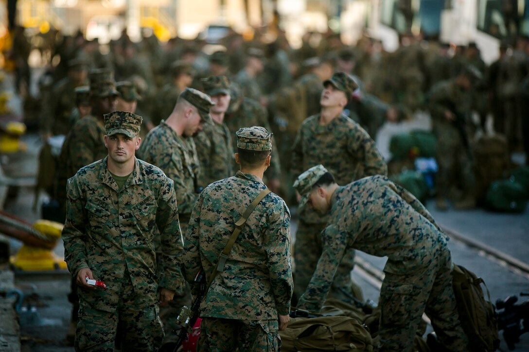 U.S. Marines and Sailors with the 26th Marine Expeditionary Unit (MEU) prepare to embark aboard the amphibious transport dock USS New York (LPD-21) as part of Composite Training Unit Exercise (COMPTUEX) at Morehead City, N.C., Nov. 5, 2017. The 26th MEU is scheduled to conduct Composite Training Unit Exercise, its final pre-deployment training exercise in preparation for an upcoming deployment at sea.