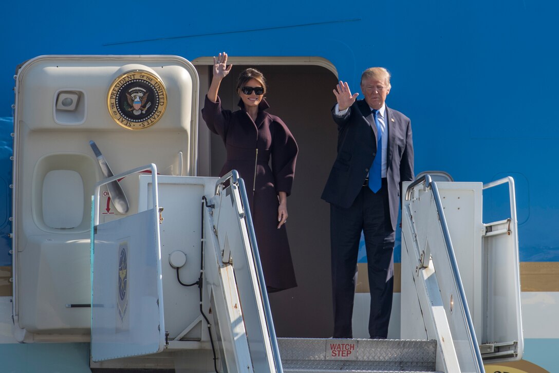 President Donald J. Trump and First Lady Melania wave goodbye to media and service members prior to boarding Air Force One, Nov. 7, 2017, at Yokota Air Base, Japan.