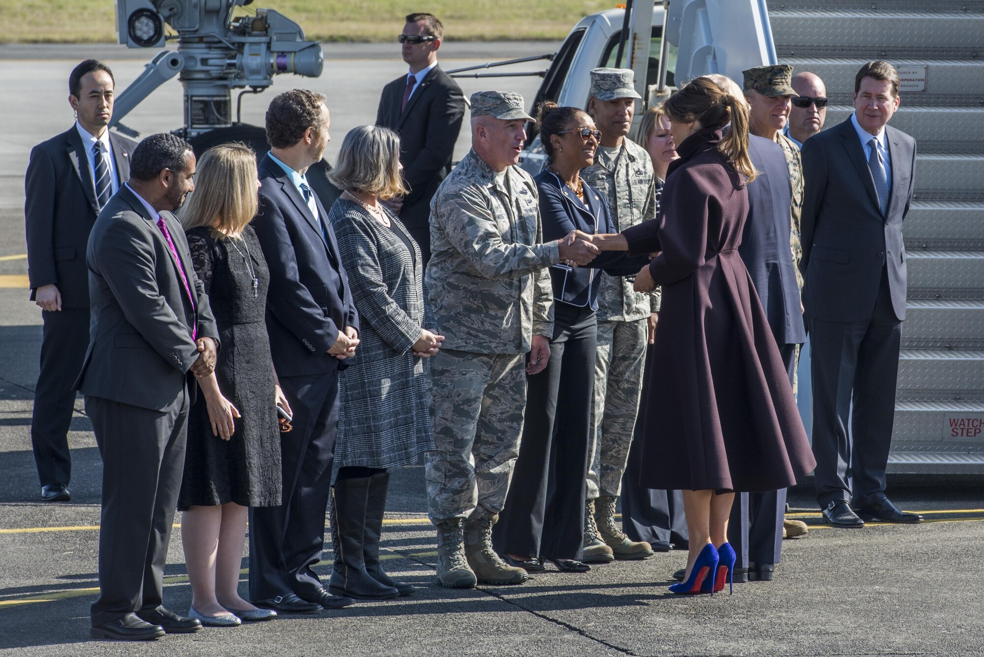 First Lady Melania Trump shakes hands with Col. Kenneth Moss, 374th Airlift Wing commander, before boarding Air Force One, Nov. 7, 2017, at Yokota Air Base, Japan.