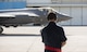 U.S. Air Force Staff Sgt. Zachary Kasperek, 34th Aircraft Maintenance Unit F-35A Lightning II crewchief, watches an F-35A  taxi for take-off at Kadena Air Base, Japan, Nov. 7, 2017. Approximately 300 Airmen and 12 F-35As from Hill Air Force Base, Utah’s 388th and 419th Fighter Wings are deployed to Kadena AB for a six-month planned rotation.  (U.S. Air Force photo by Senior Airman Omari Bernard)