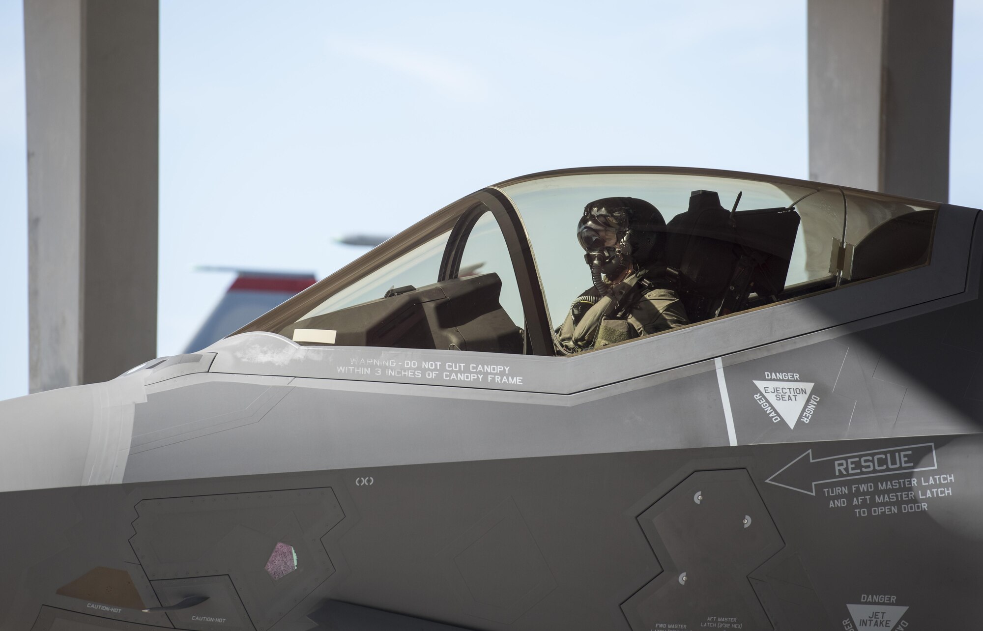 A U.S. Air Force F-35A Lightning II pilot from Hill Air Force Base, Utah, prepares his fighter jet for the first F-35A take-off from Kadena Air Base, Japan, Nov. 7, 2017. The F-35A gives global precision attack capability against current and emerging threats while complementing the air superiority of the aircraft fleets around them. (U.S. Air Force photo by Senior Airman Omari Bernard)