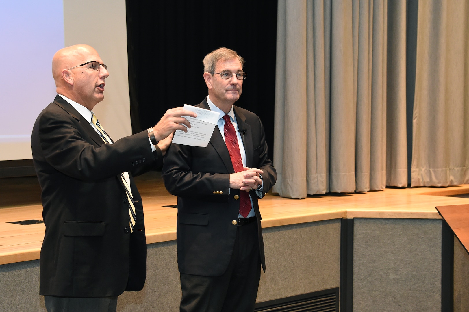 Todd Saylor (left), chief of innovation and development for U.S. Strategic Command (USSTRATCOM) thanks retired U.S. Air Force Gen. Stephen Lorenz for sharing his perspective on leadership with members of USSTRATCOM at Offutt Air Force Base, Neb., Nov. 6, 2017. Lorenz, who retired as commander of Air Education and Training Command, discussed the traits and practices of effective leaders based on his experience as a military officer and commander.