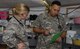 AGUADILLA, Puerto Rico – U.S. Air Force Capt. Jennifer Dunn, with the 331st Emergency Medical Support from Langley Air Force Base, and Army 1st Lt. Benjamin Sandoval, 331st Minimal Care Detachment, 49th Medical Battalion, 332nd Medical Brigade, U.S. Army Reserves, speak with a patient in front of Buen Samaritano Hospital, Nov. 3, 2017. Air Force, Army, and the Minnesota-1 disaster medical assistance team work together to provide medical aid from DMAT tents while the hospital prepares to open. (U.S. Army photo by Sgt. Avery Cunningham)