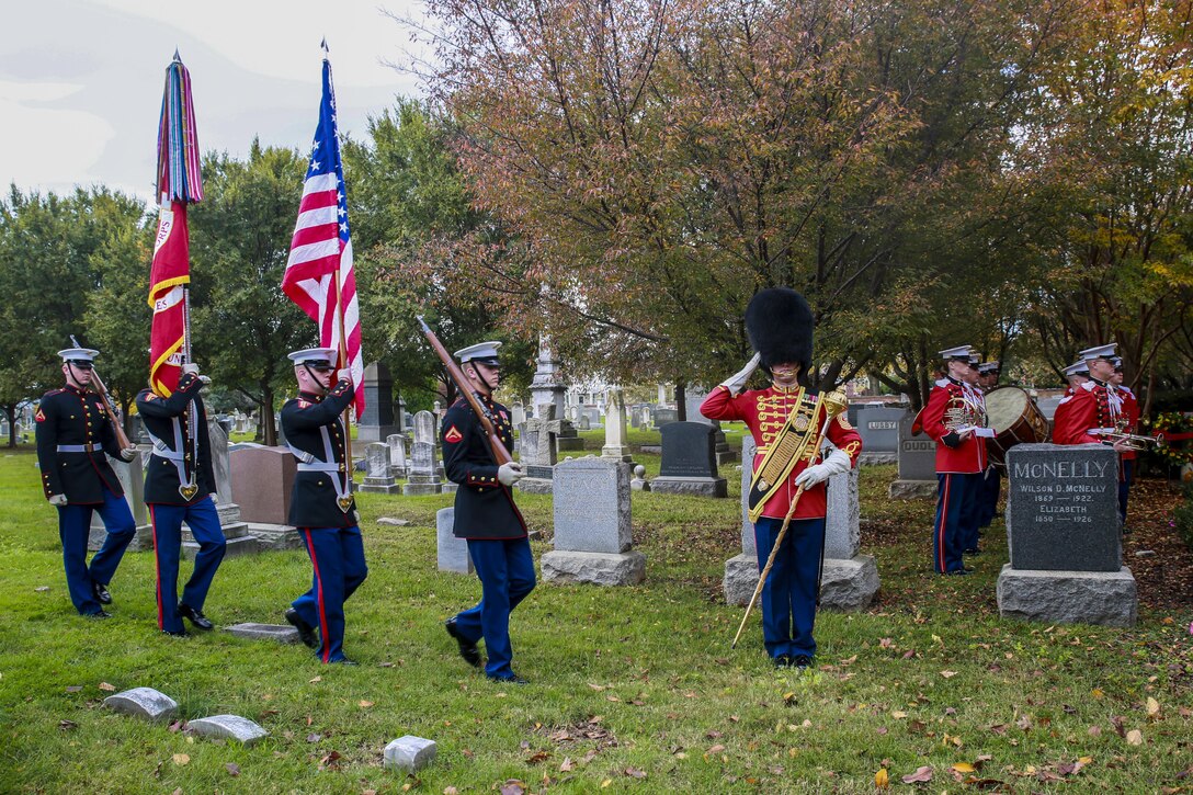 The U.S. Marine Corps Color Guard marches on the National and Marine Corps Colors during John Philip Sousa’s birthday celebration at the Congressional Cemetery, Washington D.C., Nov. 6, 2017. Today marks Sousa’s 163rd birthday and the 51st iteration of the Marine Band honoring its legendary director with a graveside birthday celebration. (Official Marine Corps photo by Cpl. Damon Mclean/Released)