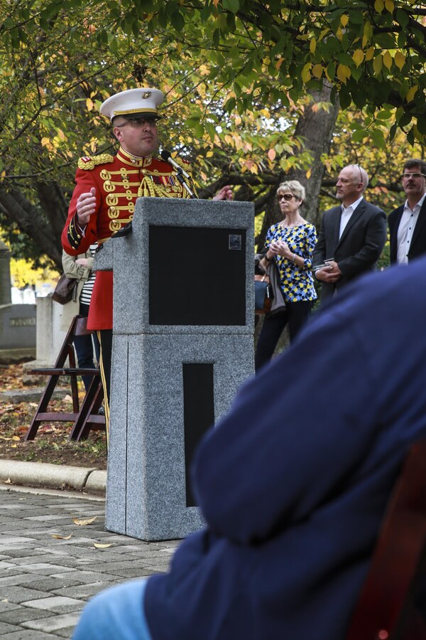 Captain Ryan J. Nowlin, assistant director, “The President’s Own” U.S. Marine Band provides remarks during John Philip Sousa’s birthday celebration at the Congressional Cemetery, Washington D.C., Nov. 6, 2017. Today marks Sousa’s 163rd birthday and the 51st iteration of the Marine Band honoring its legendary director with a graveside birthday celebration. (Official Marine Corps photo by Cpl. Damon Mclean/Released)