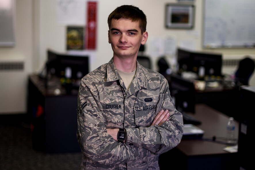 Airman 1st Class Daniel Coughlin, 92nd Communications Squadron knowledge management journeyman, poses for a photo Nov. 6, 2017, at Fairchild Air Force Base, Washington. Coughlin developed an innovative procedure to better disseminate an organizational climate survey, ultimately saving hundreds of man-hours through utilizing the base SharePoint tool kit. (U.S. Air Force photo/Senior Airman Nick Daniello)