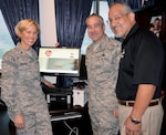 (From left) Brig. Gen. Heather Pringle, commander, 502nd Air Base Wing and Joint Base San Antonio; Chief Master Sgt. Kristopher Berg, command chief, 502nd ABW and JBSA; and Fil Jimenez, 502nd ABW technical director; look over the 2017 Combined Federal Campaign website at http://opm.gov/showsomelovecfc at the 502nd ABW headquarters at JBSA-Fort Sam Houston recently.