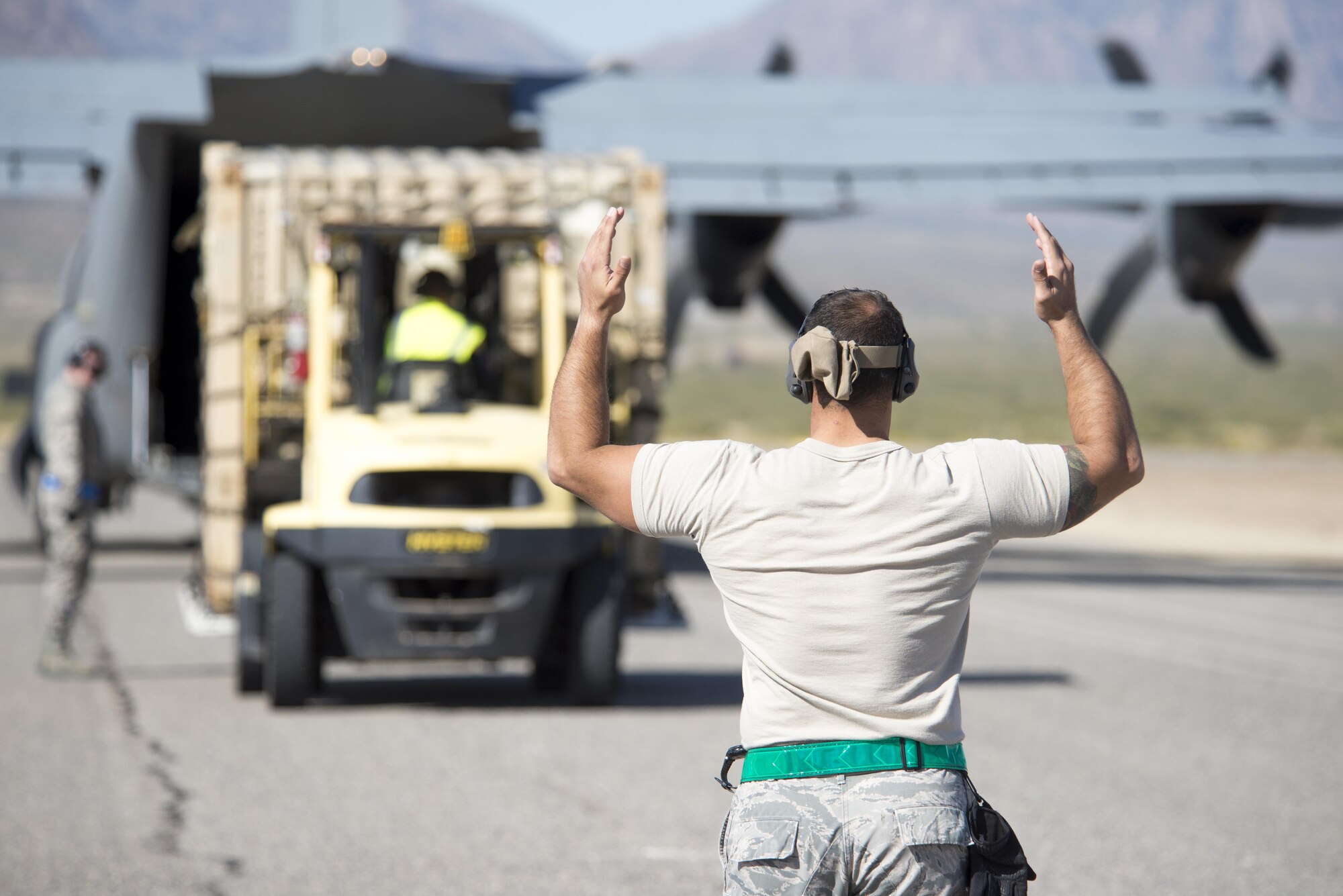 Airmen from the 49th Logistics Readiness Squadron Small Air Terminal offload equipment from a C-130 Hercules at White Sands Missile Range, N.M., in support of Vigilant Shield 18 on Oct. 31, 2017. Airmen worked with WSMR civilian logistics personnel to offload the equipment at the limited service airfield.  (U.S. Air Force photo by Tech. Sgt. Jeff Howerton)