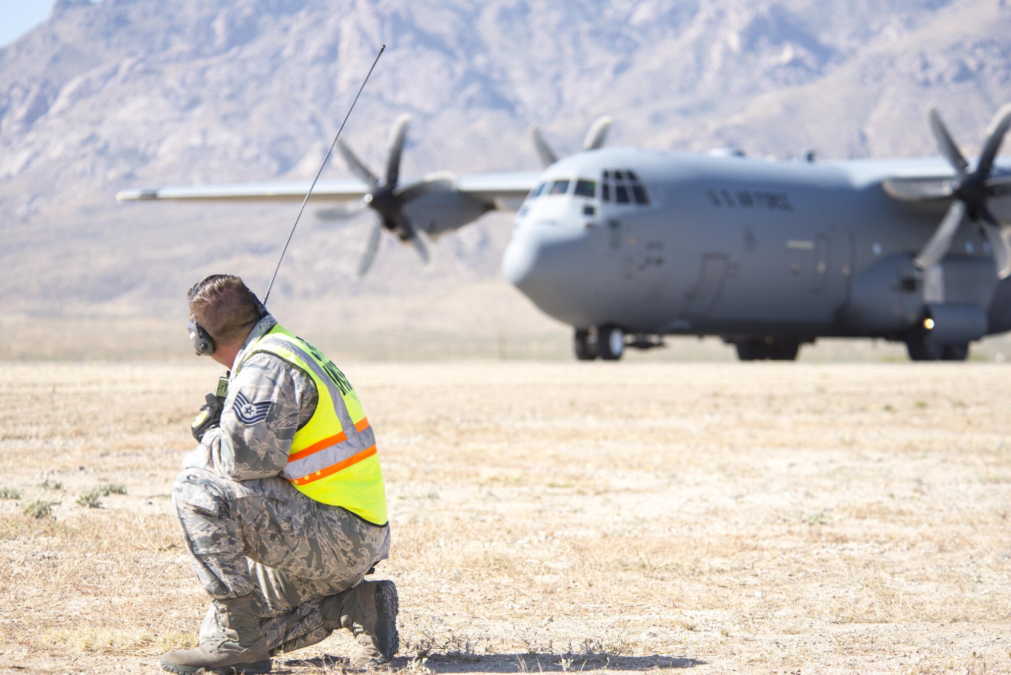 Tech. Sgt. Attila Csipes, 49th Logistics Readiness Squadron Small Air Terminal non commissioned officer in charge waits to launch out a C-130 Hercules from Little Rock Air Force Base, Ark., Oct. 31, 2017. Airmen from the 49th LRS offloaded equipment from the aircraft for Vigilant Shield 18 at White Sands Missile Range, N.M.  The equipment will be used by the 10th Mountain Division for their part of the exercise from Nov 1-9, 2017.  (U.S. Air Force photo by Tech. Sgt. Jeff Howerton)