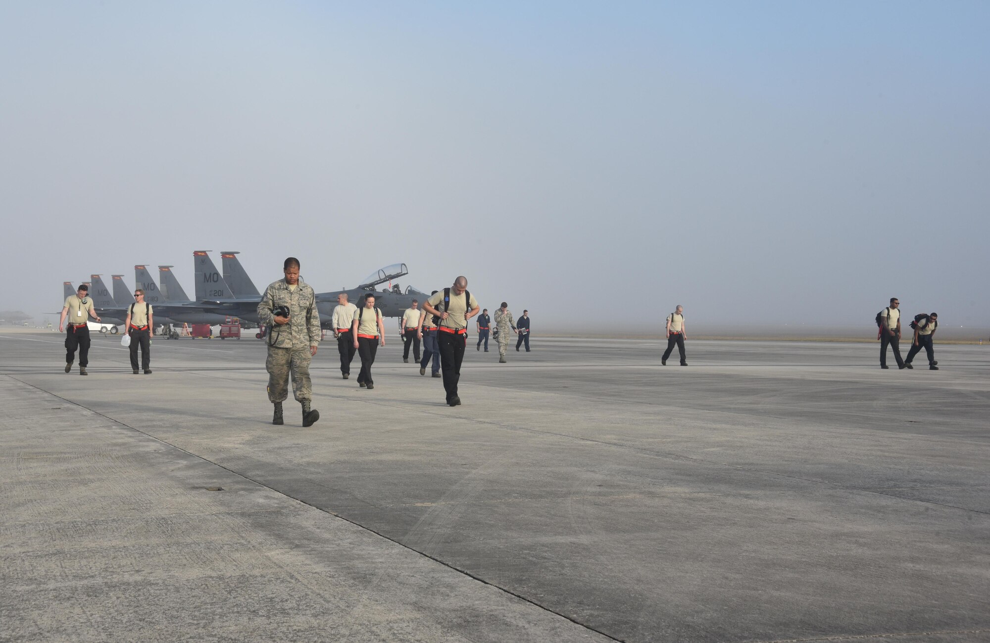 Airmen walking on flightline