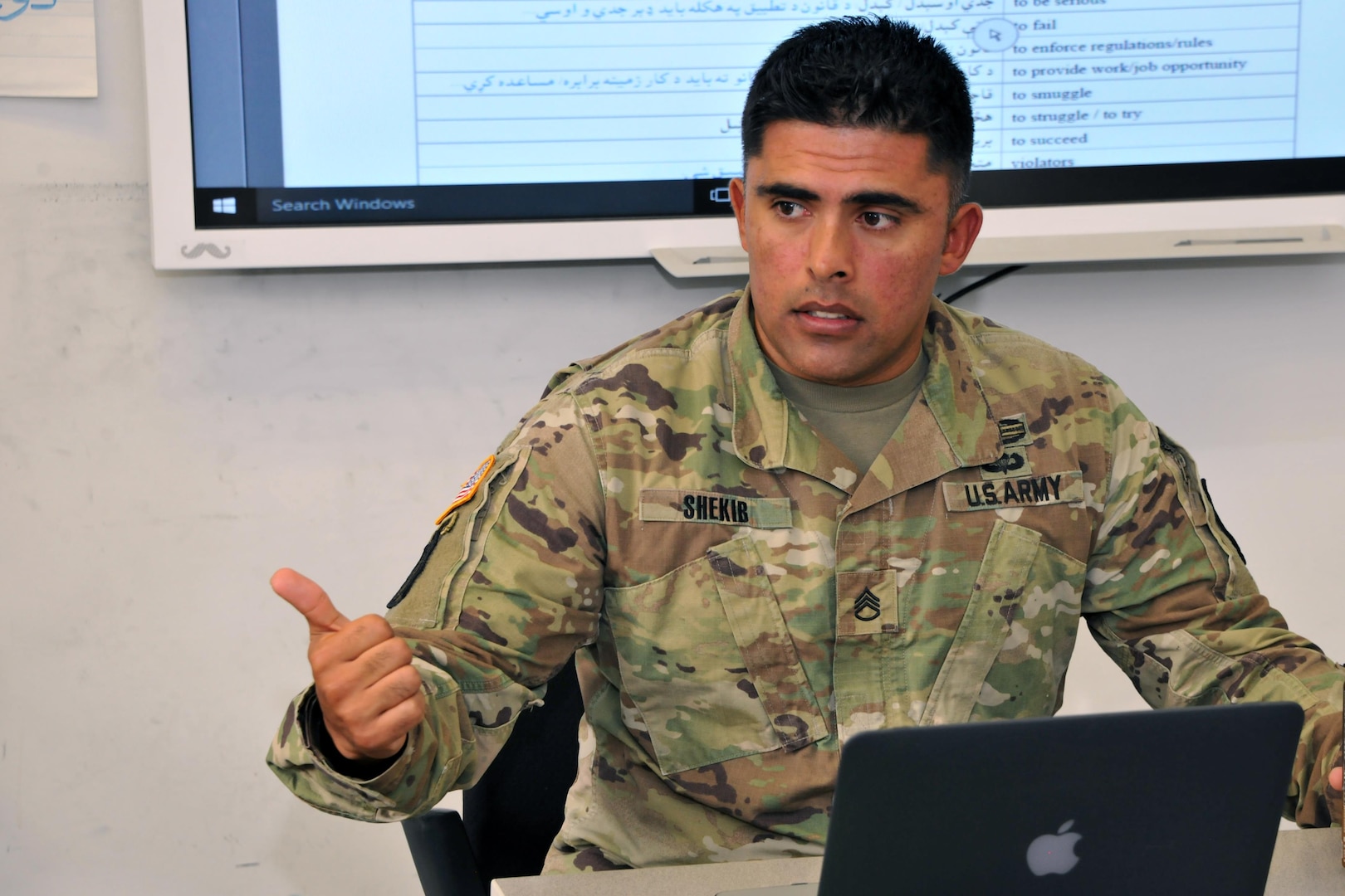 Staff Sgt. Mashal Shekib, a Military Language Instructor at the Defense Language Institute Foreign Language Center, Presidio of Monterey, California, teaches a Pashto class Nov. 3, 2017. Originally from Kabul, he immigrated to the U.S. in 2008 and enlisted in the U.S. Army in 2009. (U.S. Army photo by Patrick Bray/Released)