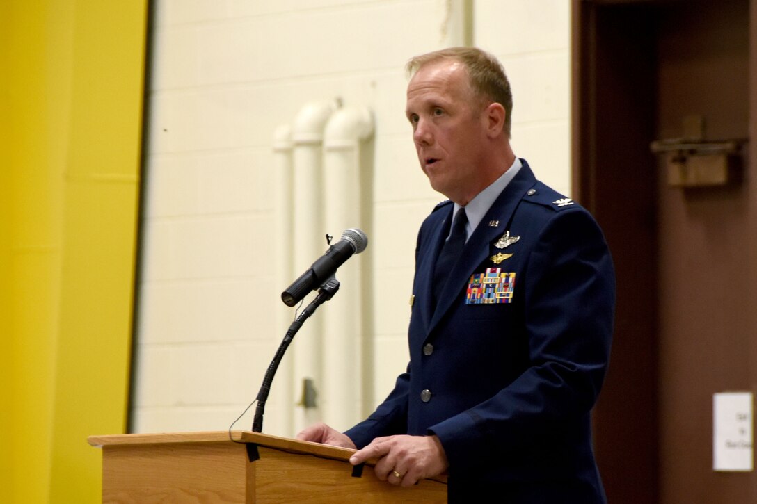 Col. Gregg Hesterman, the 178th Wing commander, assumes his new leadership position during a change of command ceremony at Springfield Air National Guard Base in Springfield, Ohio, Nov. 4, 2017. Col. John Knabel relinquished command and retired after 29 years of military service.