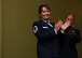 Senior Master Sgt. Donna Bridges, 94th Airlift Wing law office superintendent, claps during her retirement ceremony at Dobbins Air Reserve Base, Ga. Nov. 4, 2017. She retired after 34 years of service, with 27 of those years spent as a paralegal. (U.S. Air Force photo/Staff Sgt. Miles Wilson)