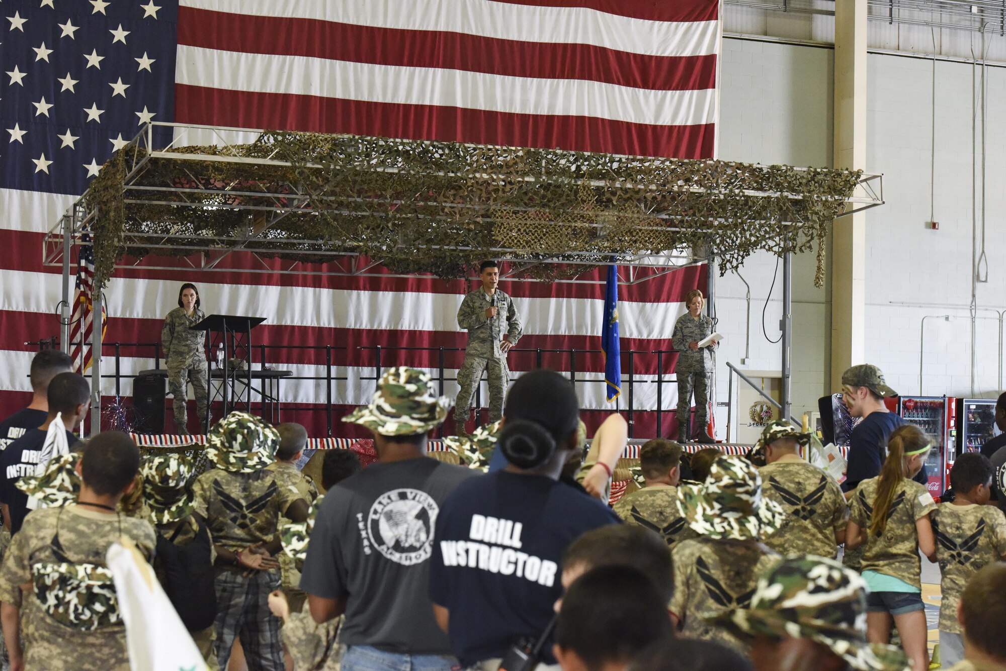 U.S. Air Force Col. Ricky Mills, 17th Training Wing commander, speaks to the group of children and their parents in the Louis F. Garland Department of Defense Fire Academy during Operation Kids Investigating Deployment Service at Goodfellow Air Force Base, Texas, Nov. 4, 2017. Mills thanked and awarded the instructors as well as congratulated the children for completing the daylong event. (U.S. Air Force photo by Airman 1st Class Zachary Chapman/Released)
