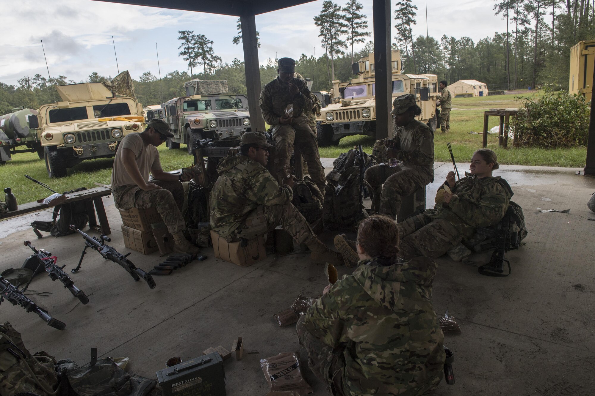 Airmen from the 823d Base Defense Squadron enjoy lunch during a mission readiness exercise, Oct. 23, 2017, at Moody Air Force Base, Ga. The 820th Base Defense Group tested the 823d BDS’s ability to operate in an austere environment with challenging scenarios that tested their capabilities and effectiveness. (U.S. Air Force Senior Airman Janiqua P. Robinson)