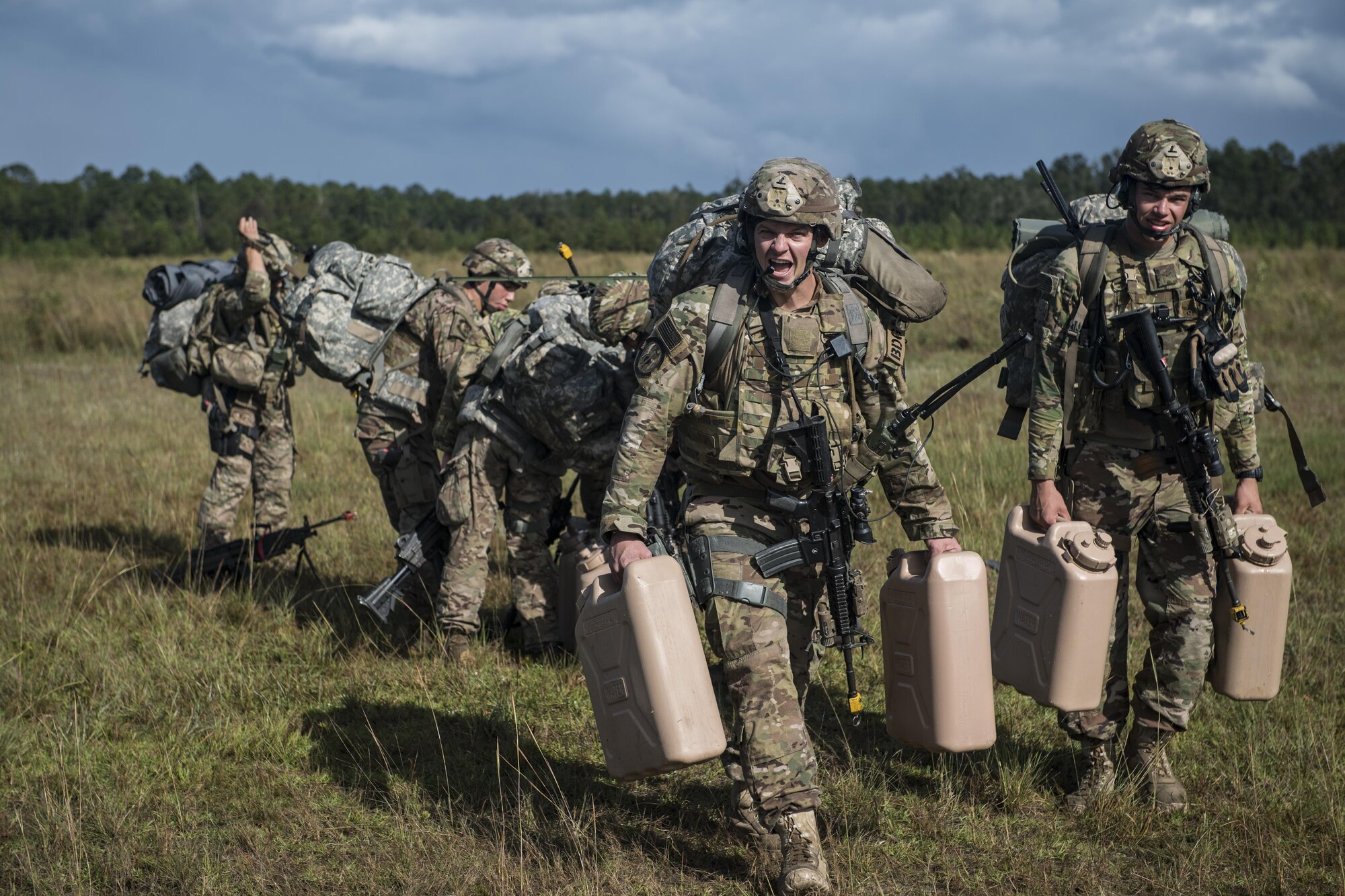 Airmen from the 823d Base Defense Squadron walk to their campsite during a mission readiness exercise, Oct. 23, 2017, at Moody Air Force Base, Ga. The 820th Base Defense Group tested the 823d BDS’s ability to operate in an austere environment with challenging scenarios that tested their capabilities and effectiveness. (U.S. Air Force Senior Airman Janiqua P. Robinson)