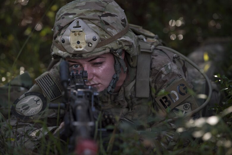 Airman 1st Class Breyana Williams, 823d Base Defense Squadron fireteam member, aims an M240B machine gun during a mission readiness exercise, Oct. 23, 2017, at Moody Air Force Base, Ga. The 820th Base Defense Group tested the 823d BDS’s ability to operate in an austere environment with challenging scenarios that tested their capabilities and effectiveness. (U.S. Air Force Senior Airman Janiqua P. Robinson)