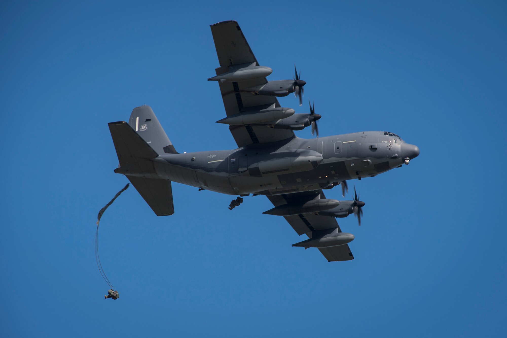 Airmen from the 820th Base Defense Group jump out of an HC-130J Combat King II, during a mission readiness exercise, Oct. 20, 2017, at Moody Air Force Base, Ga. The 820th BDG tested the 823d Base Defense Squadron’s ability to operate in an austere environment with challenging scenarios that tested their capabilities and effectiveness. (U.S. Air Force Senior Airman Janiqua P. Robinson)