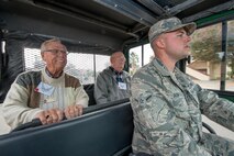 Honorary commanders ride in a gator during their tour of the 60th Mission Support Group, Nov. 3, 2017, at Travis Air Force Base, Calif. The purpose of the Travis honorary Commander Program is to promote relationships between base senior leadership and civilian partners, foster civic appreciation of the Air Force mission and its Airmen, maximize opportunities to share the Air Force story with new stewards, and to communicate mutual interest, challenges, and concerns that senior leaders and civilian stakeholders have in common. (U.S. Air Force photo by Louis Briscese)