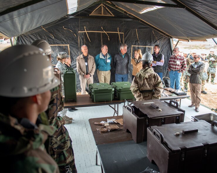 Honorary Commanders from Travis Air Force Base, Calif., prepare for their tour of the 60th Mission Support Group, Nov. 3, 2017 at Travis Air Force Bace, Calif. The purpose of the Travis Air Force Base Honorary Commander Program is to promote relationships between base senior leadership and civilian partners, foster civic appreciation of the Air Force mission and its Airmen, maximize opportunities to share the Air Force story with new stewards, and to communicate mutual interest, challenges, and concerns that senior leaders and civilian stakeholders have in common. (U.S. Air Force photo by Louis Briscese)