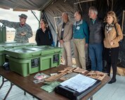 Honorary Commanders from Travis Air Force Base, Calif., prepare for their tour of the 60th Mission Support Group, Nov. 3, 2017 at Travis Air Force Bace, Calif. The purpose of the Travis Air Force Base Honorary Commander Program is to promote relationships between base senior leadership and civilian partners, foster civic appreciation of the Air Force mission and its Airmen, maximize opportunities to share the Air Force story with new stewards, and to communicate mutual interest, challenges, and concerns that senior leaders and civilian stakeholders have in common. (U.S. Air Force photo by Louis Briscese)