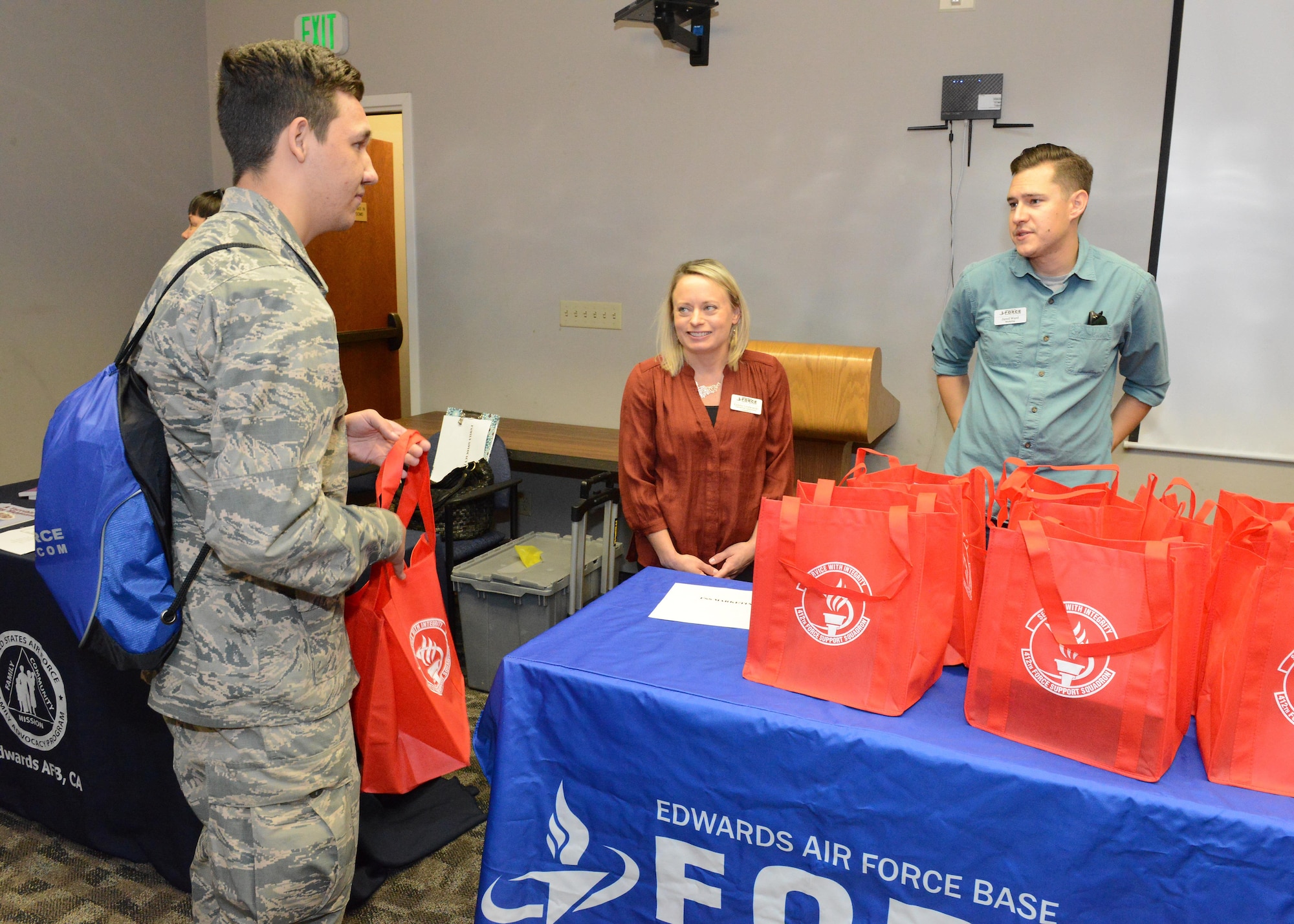 Many participants at the Newcomer’s Orientation Briefing information fair Nov. 2 handed out free gifts as a way to welcome those new to Edwards AFB. The information fair was held in the Airman and Family Readiness Center Looking Glass Room. (U.S. Air Force photo by Kenji Thuloweit)