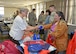 Many participants at the Newcomer’s Orientation Briefing information fair Nov. 2 handed out free gifts as a way to welcome those new to Edwards AFB. The information fair was held in the Airman and Family Readiness Center Looking Glass Room. (U.S. Air Force photo by Kenji Thuloweit)