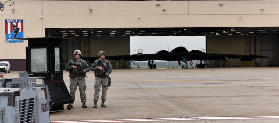 Airmen assigned to the 509th Security Forces Squadron provide flightline security during Exercise Global Thunder 2018 at Whiteman Air Force Base, Mo., Nov. 1, 2017.