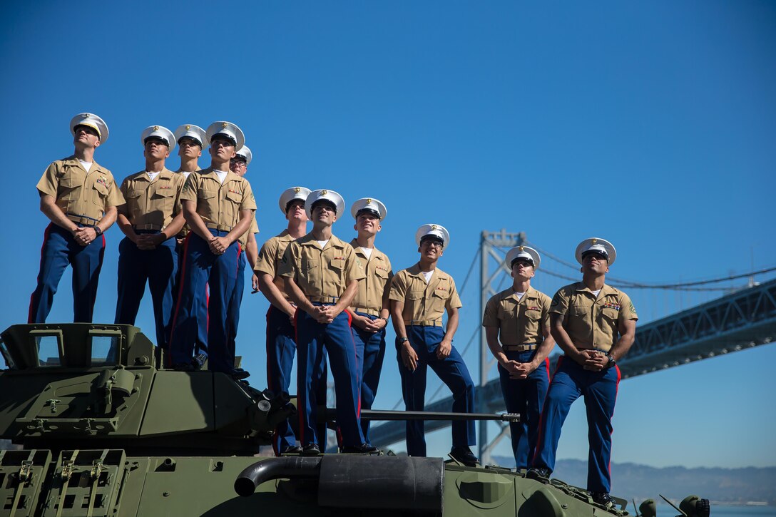 U.S. Marines with 3rd Light Armored Reconnaissance, 1st Marine Division, pose for a group photo on top of an LAV 25 A2 aboard the USS Essex LHD2 during the parade of ships during San Francisco Fleet Week Oct. 6, 2017. San Francisco Fleet Week is an opportunity for the American public to meet their Marine Corps, Navy and Coast Guard teams and experience America’s sea services. Fleet Week will highlight naval personnel, equipment, technology and capabilities, with an emphasis on humanitarian assistance and disaster relief. (U.S. Marine Corps photo by Sgt. Rodion Zabolotniy)