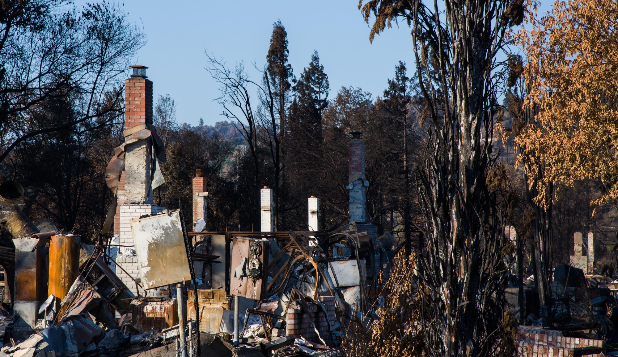 Chimneys stand as remnants of a neighborhood that was decimated by the California wildfire in Santa Rosa, Calif., on Oct. 31, 2017. The recent fires destroyed more than 15,000 homes and caused more than $3 billion in damages.