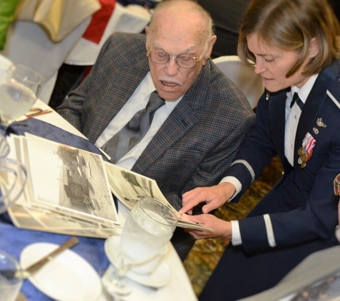 Colonel Angela Suplisson, the vice commander for the Air Force Test
Center (right) poses for a photograph after the honorary cake cutting during
the annual Veteran's Military Ball organized by Coffee4Vets at the
University of Antelope Valley in Lancaster, Nov.4. Suplisson, invited to
speak by the Coffee4Vets program, spoke about the role of the AFTC through
the years, as well as honored several of the war veterans in attendance
during her remarks.
