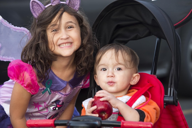 Arya and Mason Helin pose for a photo during the Trunk-or-Treat Halloween event, Headquarters Battalion (HQBN), Marine Corps Base Hawaii (MCBH), Oct. 27, 2017. The event invited Marines, Sailors, and their families to dress up, decorate their vehicles, and attend the haunted house organized by the battalion’s family readiness officer and senior leadership. Social events hosted aboard MCBH accommodate a positive community which fosters, develops and promotes resiliency within the installation. (U.S. Marine Corps photo by Lance Cpl. Luke Kuennen)
