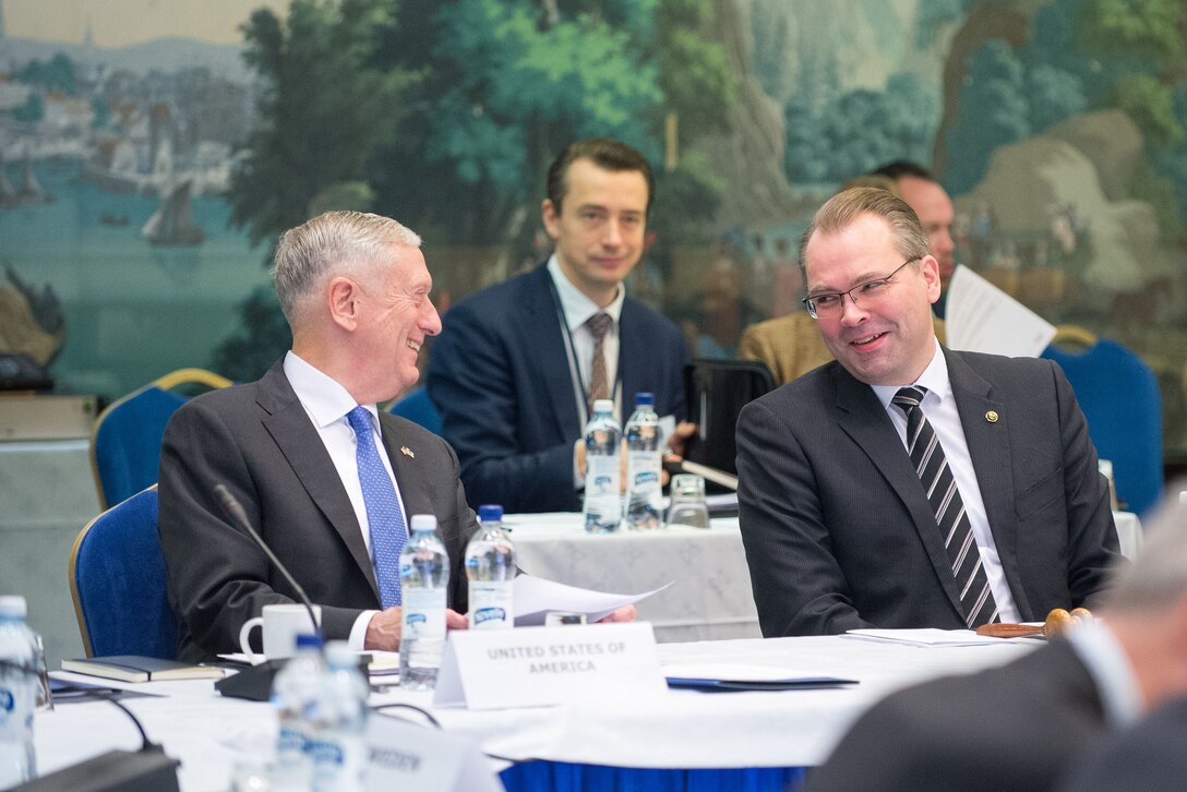 Defense Secretary Jim Mattis speaks with the Finnish defense minister.