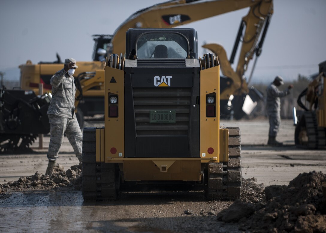 U.S. Air Force Airmen assigned to the 8th Civil Engineer Squadron participate in rapid airfield damage repair training at Kunsan Air Base, Republic of Korea, Oct. 25, 2017. Members from the Air Force Civil Engineer Center, Tyndall Air Force Base, Fla., instructed Airmen assigned to the 8th CES on the new RADR process. (U.S. Air Force photo by Staff Sgt. Victoria H. Taylor)