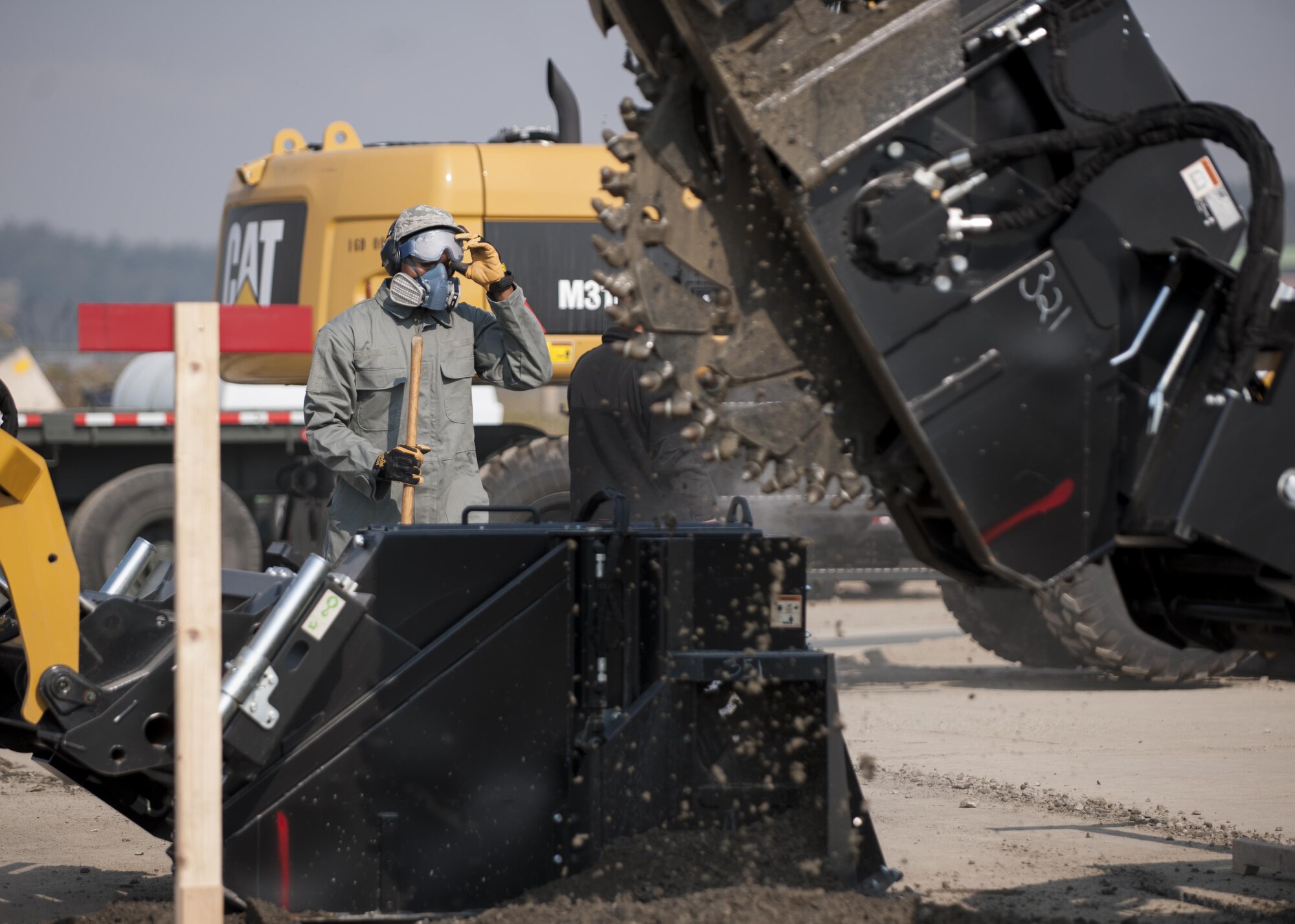 U.S. Air Force Senior Airman Gollie Felder, 8th Civil Engineer Squadron Pest Management journeyman, participates in rapid airfield damage repair training at Kunsan Air Base, Republic of Korea, Oct. 25, 2017. The new RADR process was developed by the Air Force Civil Engineer Center to repair damaged airfields at a faster pace. (U.S. Air Force photo by Staff Sgt. Victoria H. Taylor)