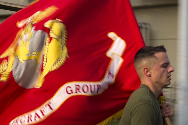 MAG-12 runs their battle colors in support of 1st MAW's 242-mile run