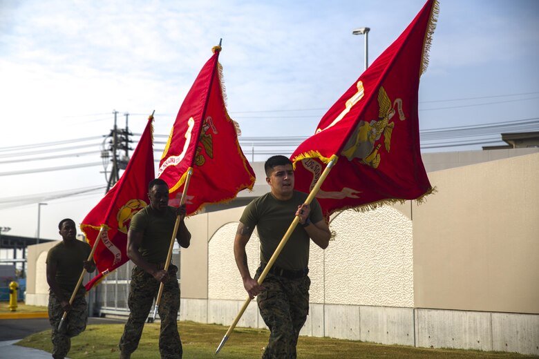 MAG-12 runs their battle colors in support of 1st MAW's 242-mile run