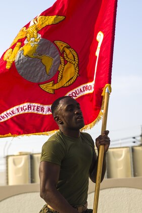 MAG-12 runs their battle colors in support of 1st MAW's 242-mile run