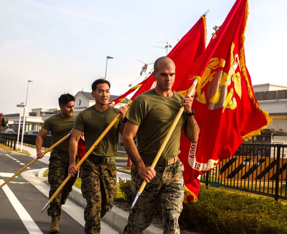 MAG-12 runs their battle colors in support of 1st MAW's 242-mile run