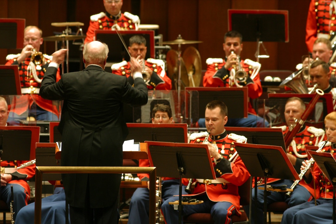 Legendary composer John Williams guest conducted the Marine Band on its 205th birthday July 11, 2003, at the Kennedy Center for the Performing Arts in Washington, D.C.. (U.S. Marine Corps photo by Master Gunnery Sgt. Ret. Andrew Linden)