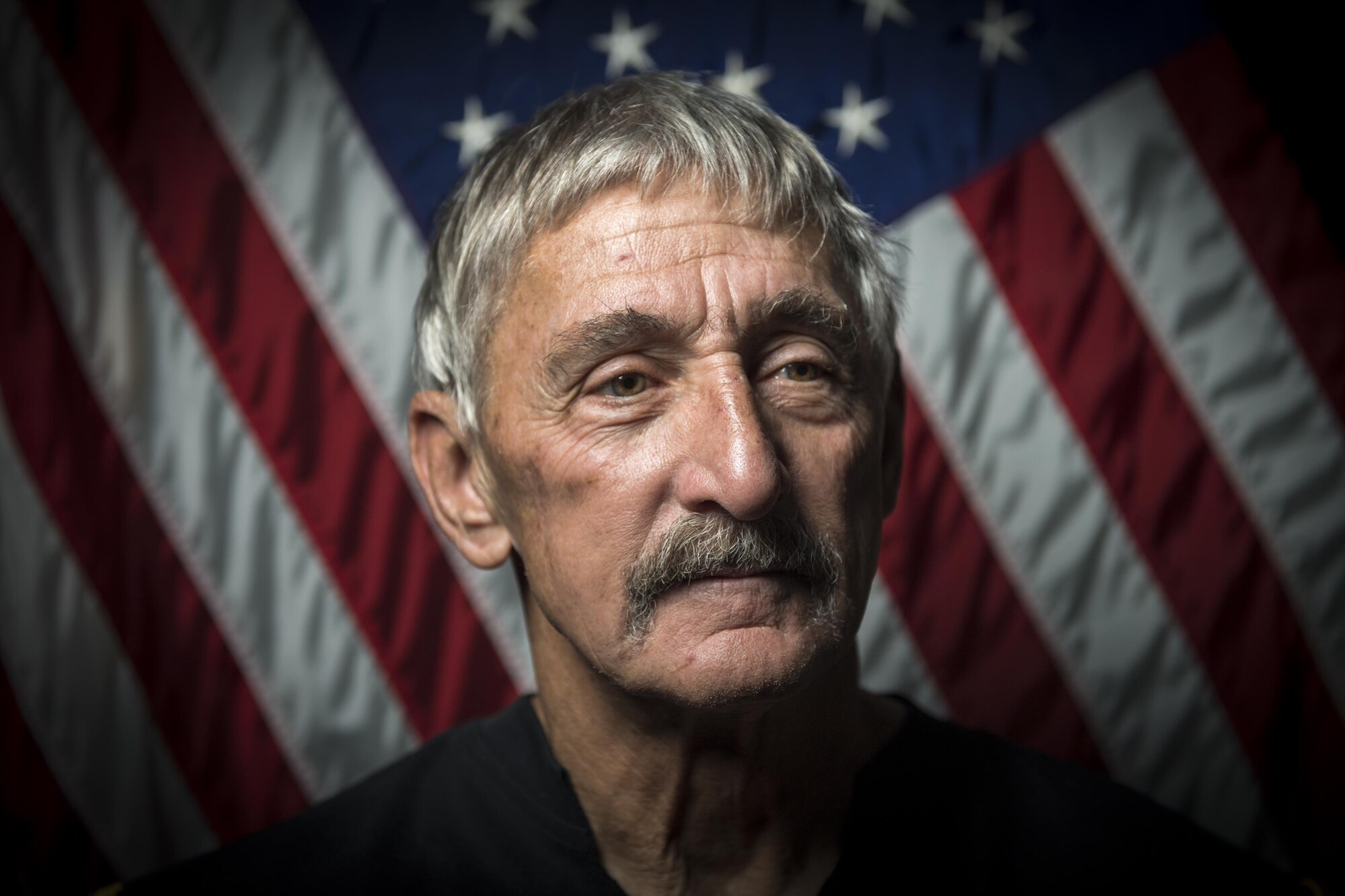 Master Sgt. (Ret.) Paul W. Dunning poses for a photo, May 9, 2017, at Moody Air Force Base, Ga. Dunning received his draft notice in October 1968 and had full intentions of joining the U.S. Marine Corps. Upon registration he was persuaded by a recruiter to join the Air Force and began his career as a tactical aircraft maintenance specialist. Dunning retired in 2002 and began crewing aircraft as a civilian which he still does. Over the years, the uniforms and names of the company have changed, but the job Dunning does has remained the same. He’s been crewing aircraft for 33 years and still loves it.